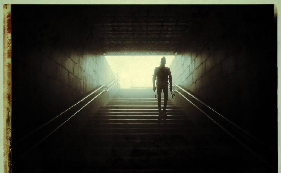 A coach walks down a tunnel as the race is delayed due to fog and poor visablity at the Men's 15 km Mass Start during day ten of the Sochi 2014 Winter Olympics. Getty Images