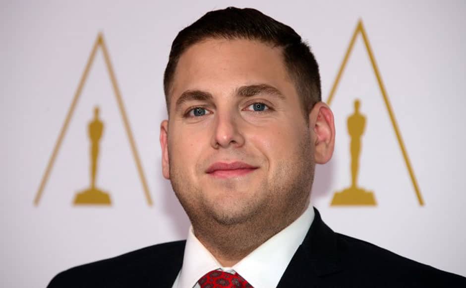 Jonah Hill poses on arrival for the 86th Oscar's Nominee's Luncheon at the Beverly Hilton Hotel in Beverly Hills, California, on February 10, 2014. AFP