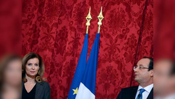 France's Hollande retreats on family policy after protests