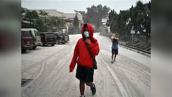 Volcanic ash results in 3 airports in Indonesia shutting, thousands flee