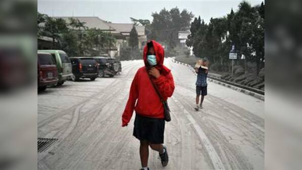 Volcanic ash results in 3 airports in Indonesia shutting, thousands flee