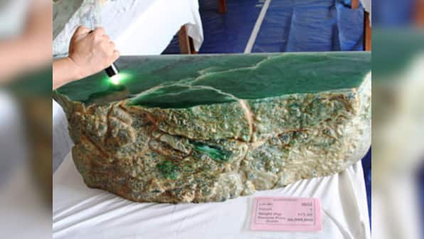 Jade boulder that could weigh up to 50 tons unearthed in Myanmar