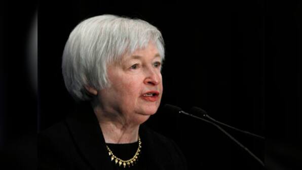 Yellen says US Fed on track to keep trimming stimulus, recovery 'far from complete'