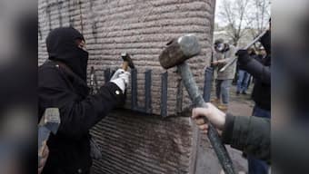 With Yanukovich out, self-proclaimed protectors take to Kiev's streets