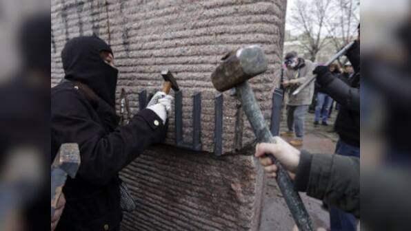 With Yanukovich out, self-proclaimed protectors take to Kiev's streets