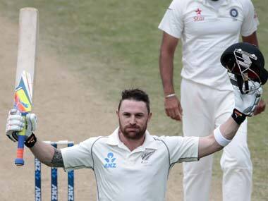 Brendon McCullum raises his arms in celebration after reaching 300. Reuters