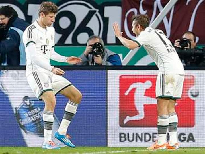 Mueller scores twice as Bayern win 14th in a row