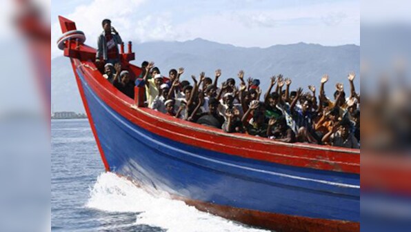 Dozens of Rohingya fleeing Myanmar go missing as boat sinks near Bangladesh