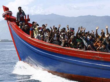 Dozens of Rohingya fleeing Myanmar go missing as boat sinks near Bangladesh