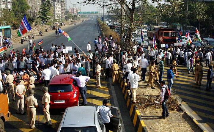 Photos: MNS workers protest toll tax, vehicles vandalised