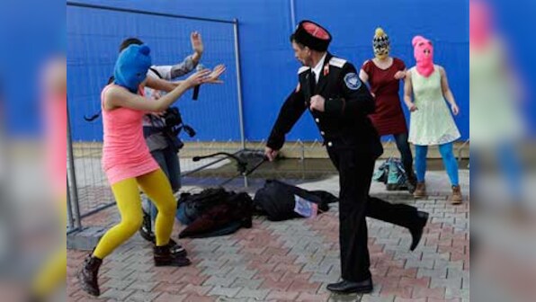 Cossack militia horsewhip Pussy Riot members at Sochi