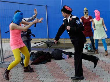 Cossack militia horsewhip Pussy Riot members at Sochi Cossack militia horsewhip Pussy Riot members at Sochi