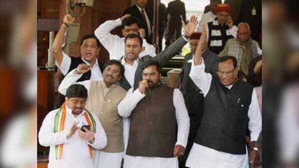 Cong wrestles LS, passes Telangana by voice vote amid din, blackout