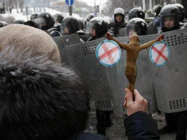 Ukraine’s riot police are seen in this photo as they clash with protestors. AP