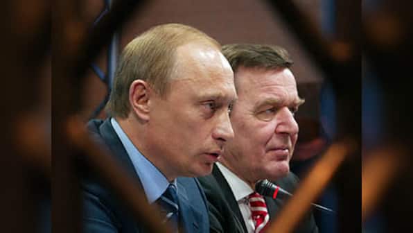Putin courts Georgia, accuses West of Cold War-style 'containment'