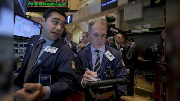 Wall Street falls; Dow, S&P end worst month since May 2012