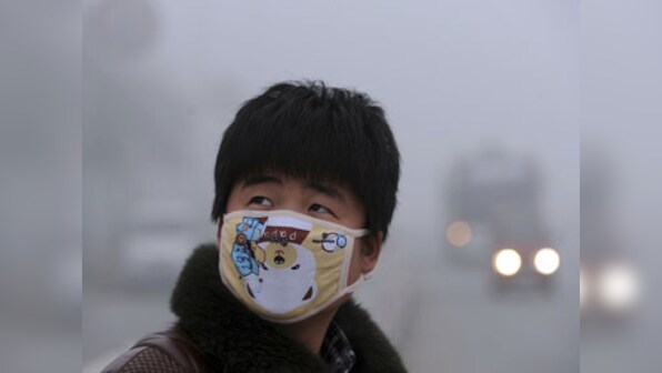 China launches pollution probe after hundreds of students fall sick