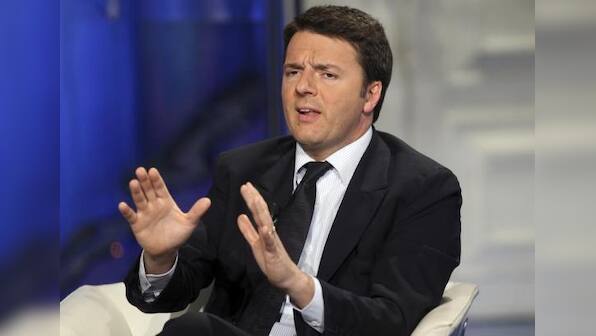 Italy's Renzi must reform troubled economy with awkward alliance