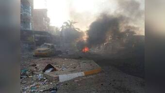 Iraq blasts: 19 killed in wave of attacks by gunmen