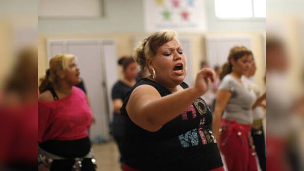 More govt regulations on burgers and fizzy drinks may reverse obesity epidemic