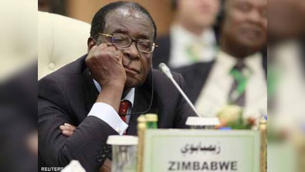Mugabe in Singapore for treatment, Zimbabwe denies cancer rumours