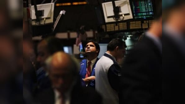 Federal Reserve's stimulus eases global market fears, gets cash flowing; Dow soars, dollar edges low