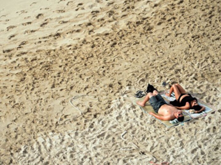 Love the new tan? You could be addicted to sunbathing!