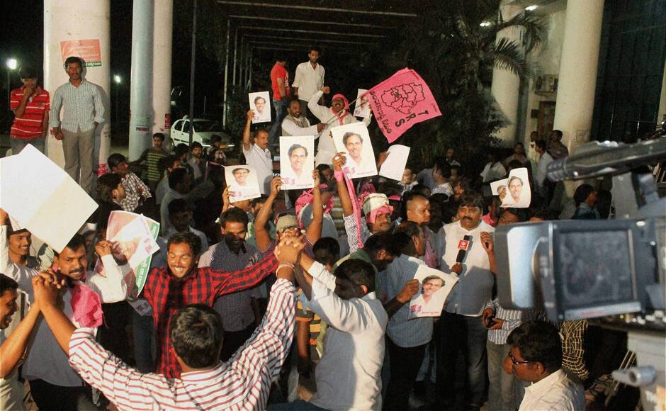 TRS activists celebrate after the passage of Telangana Bill in the Rajya Sabha, in Hyderabad on Thursday. PTI