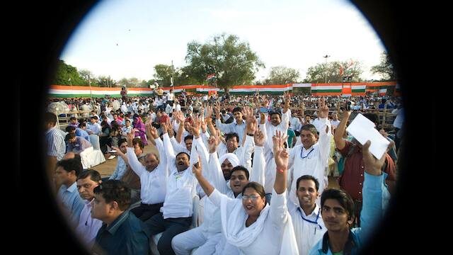Photos: Sonia takes on both Modi, Kejriwal in Delhi rally – Firstpost