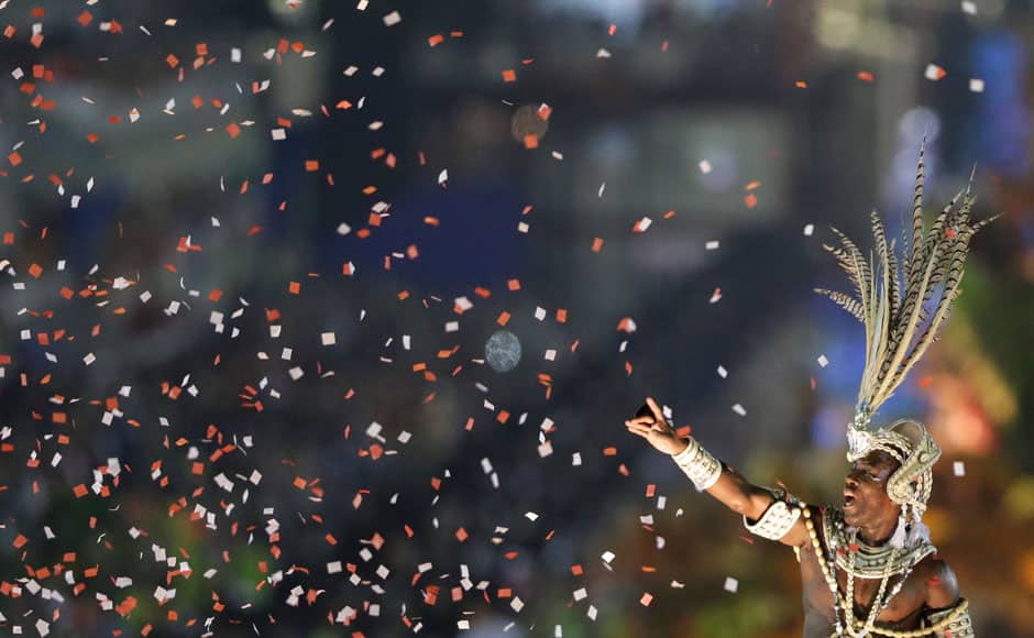 A performer from the Salgueiro samba school parades on a float during carnival celebrations at the Sambadrome in Rio de Janeiro, Brazil, Monday, March 3, 2014. AP