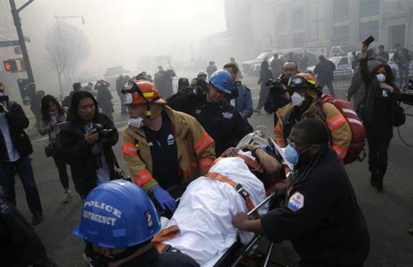NYC buildings collapse in explosion, 2 dead NYC buildings collapse in explosion, 2 dead