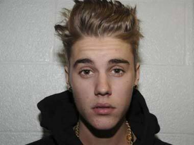 Bieber in police custody in Florida on January 23, 2014 in this Miami Beach Police Department handout. Reuters.