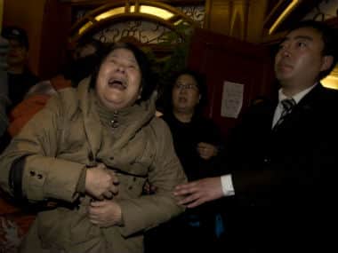A relative cries after being told that the plane had crashed. Associated Press 