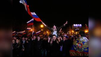 US, EU issue personal sanctions as Putin recognises Crimea 'sovereignty'