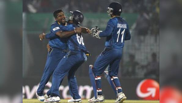 Herath's magical 5-3 spins Sri Lanka into semis