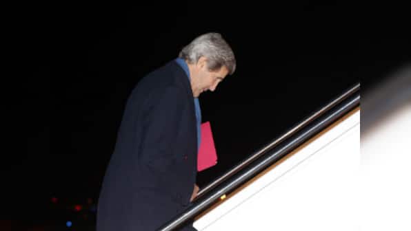 Kerry arrives in Afghanistan to broker talks over election dispute 