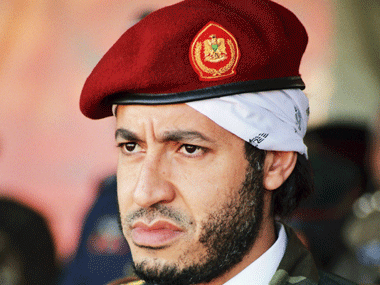 Gadhafi's son extradited to Libya from Niger, to stand trial Gadhafi's son extradited to Libya from Niger, to stand trial