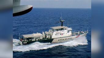 Vietnam says cannot find object thought to be door of missing Malaysia Airlines jet