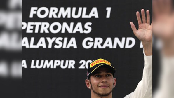 Formula One party arrives in mourning Malaysia
