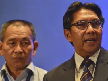 Malaysia’s Department of Civil Aviation director general Azharuddin Abdul Rahman, right, speaks as Malaysia Airlines Group Chief Executive Ahmad Jauhari Yahyain listens during a press conference at a hotel in Sepang, Malaysia. AP