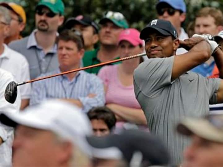 Woods back problems could cause Masters rethink