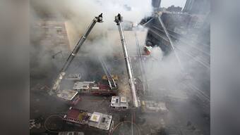 New York explosion: Rescuers search rubble 