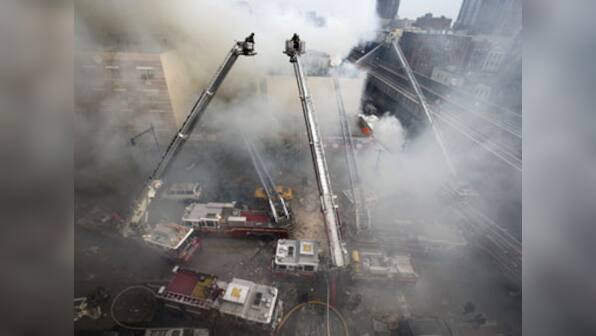 New York explosion: Rescuers search rubble 