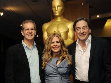 Chris Buck, left, and Jennifer Lee, center, co-directors of the Oscar-nominated animated feature film 