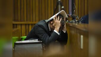 Photos of crime scene shown as Pistorius relives horror of shooting