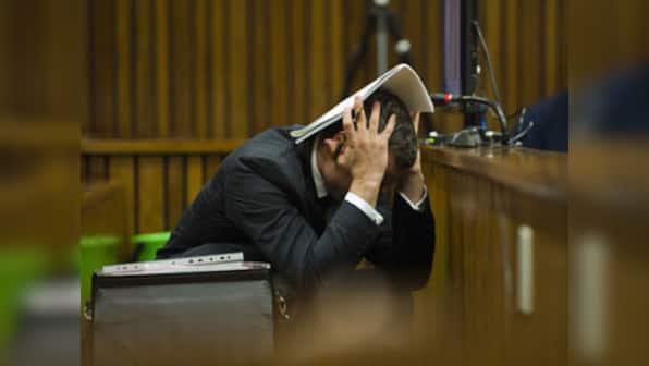 Photos of crime scene shown as Pistorius relives horror of shooting