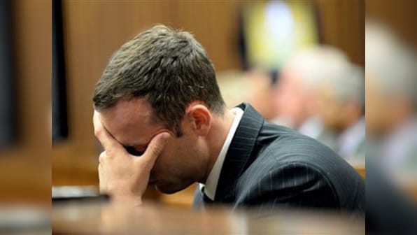 Pistorius vomits as graphic details of Steenkamp injuries revealed