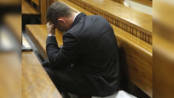 Court sees Pistorius photographs in bloody prosthetics