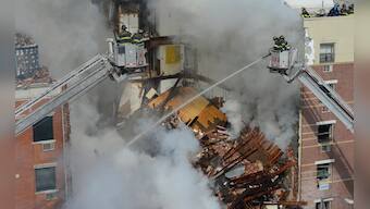 Photos: Blast triggered by gas leak flattens two New York buildings