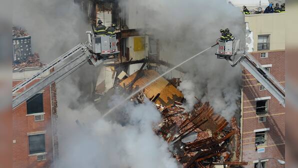 Photos: Blast triggered by gas leak flattens two New York buildings